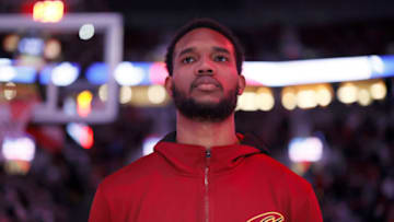 PORTLAND, OREGON - JANUARY 07: Evan Mobley # 4 of the Cleveland Cavaliers stands during the national anthem before the game against the Portland Trail Blazers at Moda Center on January 07, 2022 in Portland, Oregon. NOTE TO USER: User expressly acknowledges and agrees that, by downloading and or using this photograph, User is consenting to the terms and conditions of the Getty Images License Agreement. (Photo by Soobum Im/Getty Images)