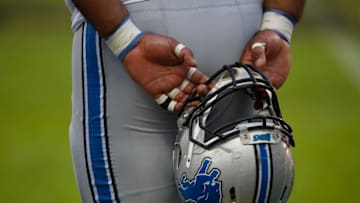 LONDON, ENGLAND - NOVEMBER 01: A Detroit Lions player holds his helmet during the NFL game between Kansas City Chiefs and Detroit Lions at Wembley Stadium on November 01, 2015 in London, England. (Photo by Alan Crowhurst/Getty Images)