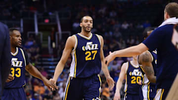 Apr 3, 2016; Phoenix, AZ, USA; Utah Jazz center Rudy Gobert (27) is congratulated by teammates in the first half of the game against the Phoenix Suns at Talking Stick Resort Arena. Mandatory Credit: Jennifer Stewart-USA TODAY Sports