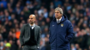 MANCHESTER, ENGLAND - NOVEMBER 25: (R-L) Manuel Pellegrini the manager of Manchester City and Josep Guardiola the head coach of Bayern Muenchen look on during the UEFA Champions League Group E match between Manchester City and FC Bayern Muenchen at the Etihad Stadium on November 25, 2014 in Manchester, United Kingdom. (Photo by Alex Livesey/Getty Images)
