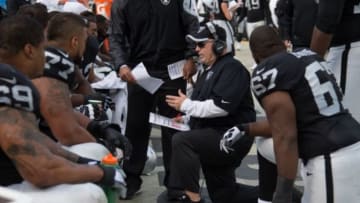 December 21, 2014; Oakland, CA, USA; Oakland Raiders head coach Tony Sparano instructs in a team huddle on the bench during the second quarter against the Buffalo Bills at O.co Coliseum. Mandatory Credit: Kyle Terada-USA TODAY Sports