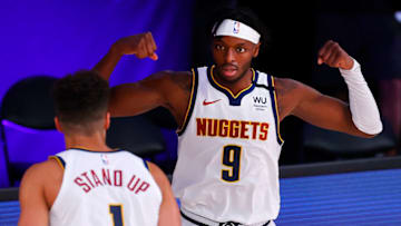 LAKE BUENA VISTA, FLORIDA - AUGUST 06: Jerami Grant #9 of the Denver Nuggets celebrates with Michael Porter Jr. #1 of the Denver Nuggets after a basket and drawing a foul during the third quarter against the Portland Trail Blazers at Visa Athletic Center at ESPN Wide World Of Sports Complex on August 06, 2020 in Lake Buena Vista, Florida. NOTE TO USER: User expressly acknowledges and agrees that, by downloading and or using this photograph, User is consenting to the terms and conditions of the Getty Images License Agreement. (Photo by Kevin C. Cox/Getty Images)