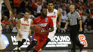 Mar 22, 2014; Buffalo, NY, USA; Dayton Flyers Khari Price (0) looks to pass against Syracuse Orange in the second half of a men