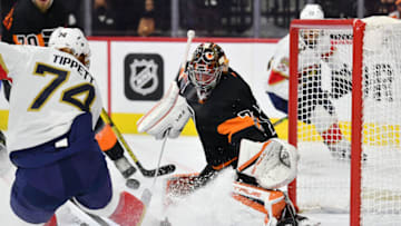 Oct 23, 2021; Philadelphia, Pennsylvania, USA; Florida Panthers right wing Owen Tippett (74) scores a goal against Philadelphia Flyers goaltender Carter Hart (79) during the second period at Wells Fargo Center. Mandatory Credit: Eric Hartline-USA TODAY Sports
