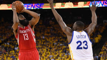 April 16, 2016; Oakland, CA, USA; Houston Rockets guard James Harden (13) shoots the basketball against Golden State Warriors forward Draymond Green (23) during the first quarter in game one of the first round of the NBA Playoffs at Oracle Arena. Mandatory Credit: Kyle Terada-USA TODAY Sports