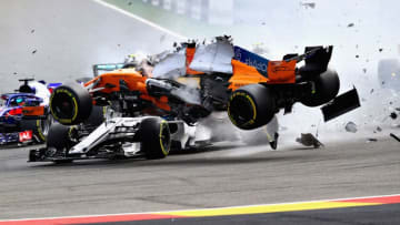 SPA, BELGIUM - AUGUST 26: Fernando Alonso of Spain driving the (14) McLaren F1 Team MCL33 Renault launches over the top of Charles Leclerc of Monaco driving the (16) Alfa Romeo Sauber F1 Team C37 Ferrari at the start during the Formula One Grand Prix of Belgium at Circuit de Spa-Francorchamps on August 26, 2018 in Spa, Belgium. (Photo by Mark Thompson/Getty Images)