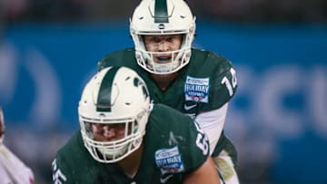 SAN DIEGO, CA - DECEMBER 28: Brian Lewerke (14) of the Michigan State Spartans in the game between the Washington State Cougars and the Michigan State Spartans on December 28, 2017 at the Holiday Bowl in San Diego, CA. (Photo by Jordon Kelly/Icon Sportswire via Getty Images)