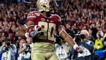 MIAMI GARDENS, FL - DECEMBER 30: Nyqwan Murray #80 of the Florida State Seminoles scores a touchdown in the fourth quarter against the Michigan Wolverines during the Capitol One Orange Bowl at Sun Life Stadium on December 30, 2016 in Miami Gardens, Florida. (Photo by Chris Trotman/Getty Images)