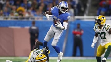 DETROIT, MI - OCTOBER 07: Theo Riddick #25 of the Detroit Lions catches a pass against Oren Burks #42 of the Green Bay Packers and Josh Jackson #37 during the first half at Ford Field on October 7, 2018 in Detroit, Michigan. (Photo by Gregory Shamus/Getty Images)
