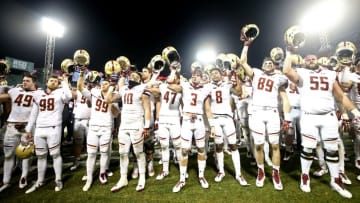 BOSTON, MA - NOVEMBER 18: Boston College Eagles celebrate after defeating the Connecticut Huskies 39-16 at Fenway Park on November 18, 2017 in Boston, Massachusetts. (Photo by Maddie Meyer/Getty Images)