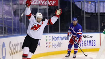 NEW YORK, NEW YORK - JANUARY 19: Travis Zajac #19 of the New Jersey Devils celebrates his goal against the New York Rangers at 32 seconds of the first period at Madison Square Garden on January 19, 2021 in New York City. (Photo by Bruce Bennett/Getty Images)