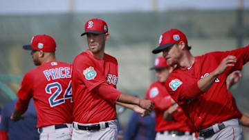 Feb 20, 2016; Lee County, FL, USA; Boston Red Sox starting pitcher Rick Porcello (22), Boston Red Sox starting pitcher David Price (24) and Boston Red Sox relief pitcher Craig Kimbrel (46) stretch as they works out at Jet Blue Park. Mandatory Credit: Kim Klement-USA TODAY Sports