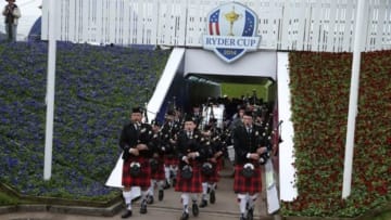 Sep 24, 2014; Auchterarder, Perthshire, SCT; The Community School of Auchterarder Pipe Band leads a procession to the first tee followed by the members of the Junior Ryder Cup Team during practice for the 2014 Ryder Cup at The Gleneagles Hotel-PGA Centenary Course. Mandatory Credit: Brian Spurlock-USA TODAY Sports