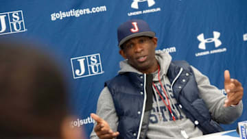 Deion Sanders was having none of a notorious Twitter troll spreading misinformation about him flying to Atlanta to meet with Auburn football Mandatory Credit: The Clarion-Ledger