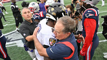New England Patriots head coach Bill Belichick hugs Baltimore Ravens quarterback Lamar Jackson (8) after a game at Gillette Stadium. Mandatory Credit: Brian Fluharty-USA TODAY Sports