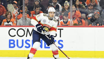 PHILADELPHIA, PA - NOVEMBER 13: Florida Panthers defenseman Bogdan Kiselevich (55) looks to pass during a NHL game between the Florida Panthers and the Philadelphia Flyers on November 13, 2018, at the Wells Fargo Center in Philadelphia, PA. Photo by Andy Lewis/Icon Sportswire via Getty Images)