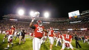 Nov 8, 2014; Baton Rouge, LA, USA; Alabama Crimson Tide linebacker Rashaan Evans (32) celebrates after an overtime win against the LSU Tigers in a game at Tiger Stadium. Alabama defeated LSU 20-13. Mandatory Credit: Derick E. Hingle-USA TODAY Sports