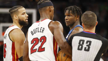 Miami Heat forward Jimmy Butler (22) and Minnesota Timberwolves forward Anthony Edwards (1) exchange some actions(Bruce Kluckhohn-USA TODAY Sports)