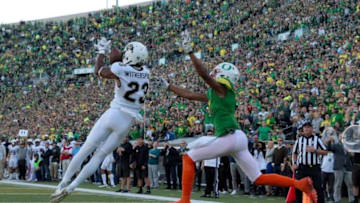 Sep 24, 2016; Eugene, OR, USA; Colorado Buffaloes defensive back Ahkello Witherspoon (23) intercepts the ball against Oregon Ducks wide receiver Darren Carrington II (7) at Autzen Stadium. Mandatory Credit: Scott Olmos-USA TODAY Sports