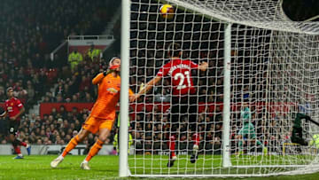 MANCHESTER, ENGLAND - DECEMBER 05: Shkodran Mustafi of Arsenal scores a goal to make it 0-1 during the Premier League match between Manchester United and Arsenal FC at Old Trafford on December 5, 2018 in Manchester, United Kingdom. (Photo by Robbie Jay Barratt - AMA/Getty Images)