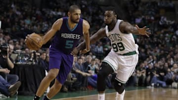 Dec 16, 2016; Boston, MA, USA; Charlotte Hornets guard Nicolas Batum (5) works the ball against Boston Celtics guard forward Jae Crowder (99) in the second quarter at TD Garden. Mandatory Credit: David Butler II-USA TODAY Sports