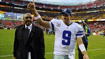 Dec 8, 2013; Landover, MD, USA; Dallas Cowboys quarterback Tony Romo (9) walks off the field after defeating the Washington Redskins at FedEx Field. Mandatory Credit: Brad Mills-USA TODAY Sports