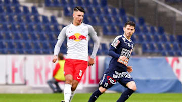 WALS BEI SALZBURG, AUSTRIA - OCTOBER 27: Dominik Szoboszlai of Liefering and Mirnes Becirovic of FAC Wien compete for the ball during the 2. Liga match between FC FC Liefering v FAC Wien at Red Bull Arena on October 27, 2018 in Wals bei Salzburg, Austria. (Photo by Franz Kirchmayr/SEPA.Media /Getty Images)