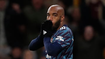 Arsenal's French striker Alexandre Lacazette reacts to missing a chance during the English Premier League football match between Wolverhampton Wanderers and Arsenal at the Molineux stadium in Wolverhampton, central England on February 10, 2022. - RESTRICTED TO EDITORIAL USE. No use with unauthorized audio, video, data, fixture lists, club/league logos or 'live' services. Online in-match use limited to 120 images. An additional 40 images may be used in extra time. No video emulation. Social media in-match use limited to 120 images. An additional 40 images may be used in extra time. No use in betting publications, games or single club/league/player publications. (Photo by Adrian DENNIS / AFP) / RESTRICTED TO EDITORIAL USE. No use with unauthorized audio, video, data, fixture lists, club/league logos or 'live' services. Online in-match use limited to 120 images. An additional 40 images may be used in extra time. No video emulation. Social media in-match use limited to 120 images. An additional 40 images may be used in extra time. No use in betting publications, games or single club/league/player publications. / RESTRICTED TO EDITORIAL USE. No use with unauthorized audio, video, data, fixture lists, club/league logos or 'live' services. Online in-match use limited to 120 images. An additional 40 images may be used in extra time. No video emulation. Social media in-match use limited to 120 images. An additional 40 images may be used in extra time. No use in betting publications, games or single club/league/player publications. (Photo by ADRIAN DENNIS/AFP via Getty Images)