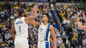 Nov 27, 2019; Indianapolis, IN, USA; Indiana Pacers forward T.J. Warren (1) and guard Malcolm Brogdon (7) celebrate an and one basket and foul in the second quarter against the Utah Jazz at Bankers Life Fieldhouse. Mandatory Credit: Trevor Ruszkowski-USA TODAY Sports