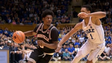 DURHAM, NC - FEBRUARY 21: Darius Perry #2 of the Louisville Cardinals drives against Trevon Duval #1 of the Duke Blue Devils during their game at Cameron Indoor Stadium on February 21, 2018 in Durham, North Carolina. Duke won 82-56. (Photo by Grant Halverson/Getty Images)