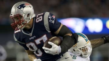 Oct 29, 2015; Foxborough, MA, USA; New England Patriots tight end Rob Gronkowski (87) runs the ball against the Miami Dolphins in the second half at Gillette Stadium. The Patriots defeated the Miami Dolphins 36-7. Mandatory Credit: David Butler II-USA TODAY Sports