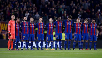 Barcelona's players observe a minute of silence for the victims of an airplane crash one week ago, including members of the Brazilian football club Chapecoense before the UEFA Champions League Group C football match FC Barcelona vs Borussia Moenchengladbach at the Camp Nou stadium in Barcelona, on December 6, 2016. / AFP / JOSEP LAGO (Photo credit should read JOSEP LAGO/AFP/Getty Images)