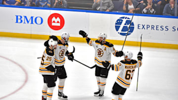 ST LOUIS, MISSOURI - JUNE 09: Zdeno Chara #33 of the Boston Bruins is congratulated by his teammates after scoring a third period empty-net goal against the St. Louis Blues in Game Six of the 2019 NHL Stanley Cup Final at Enterprise Center on June 09, 2019 in St Louis, Missouri. (Photo by Ed Zurga/Getty Images)