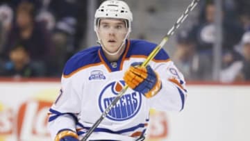 Mar 6, 2016; Winnipeg, Manitoba, CAN; Edmonton Oilers center Connor McDavid (97) watches the play during the first period against the Winnipeg Jets at MTS Centre. Mandatory Credit: Bruce Fedyck-USA TODAY Sports
