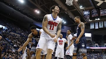 Feb 18, 2016; Hartford, CT, USA; Southern Methodist Mustangs guard Nic Moore (11) reacts after being called for charging foul against Connecticut Huskies center Amida Brimah (35) in the second half at XL Center. UConn defeated SMU 68-62. Mandatory Credit: David Butler II-USA TODAY Sports