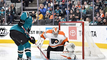 SAN JOSE, CA - DECEMBER 28: Tomas Hertl #48 of the San Jose Sharks takes a shot on goal against Carter Hart #79 of the Philadelphia Flyers at SAP Center on December 28, 2019 in San Jose, California. (Photo by Brandon Magnus/NHLI via Getty Images)