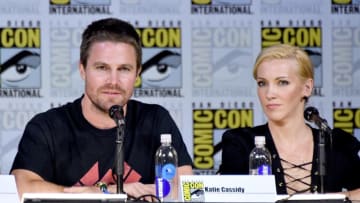 SAN DIEGO, CA - JULY 22: Actors Stephen Amell (L) and Katie Cassidy attend the 'Arrow' Video Presentation And Q A during Comic-Con International 2017 at San Diego Convention Center on July 22, 2017 in San Diego, California. (Photo by Mike Coppola/Getty Images)