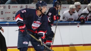 BUFFALO, NY - SEPTEMBER 24: Luke McInnis #5 of Team Plante controls the puck against Team Roenick during the CCM/USA Hockey All-American Prospects Game on September 24, 2015 at First Niagara Center in Buffalo, New York. Team Plante defeated Team Roenick 6-4. (Photo by Jen Fuller/Getty Images)