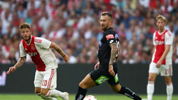 AMSTERDAM, NETHERLANDS - JULY 25: Lasse Schone of Ajax and Peter Zulj of SK Sturm Graz battle for possession during the first leg UEFA Champions League Qualifier match between Ajax and SK Sturm Graz at Amsterdam Arena on July 25, 2018 in Amsterdam, Netherlands. (Photo by Dean Mouhtaropoulos/Getty Images)