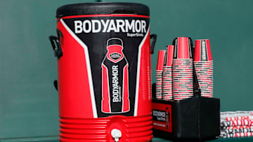 TEMPE, AZ - MARCH 06: A Bodyarmor SuperDrink cooler and cups are seen in the dugout before a spring training game between the Los Angeles Angels of Anaheim and the Chicago Cubs at Tempe Diablo Stadium on March 06, 2017 in Tempe, Arizona. (Photo by Tim Warner/Getty Images)'n'n