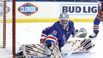 Apr 25, 2021; New York, New York, USA; Igor Shesterkin #31 of the New York Rangers stops a shot in the first period against the Buffalo Sabres at Madison Square Garden on April 25, 2021 in New York City. Mandatory Credit: Elsa/Pool Photo-USA TODAY Sports