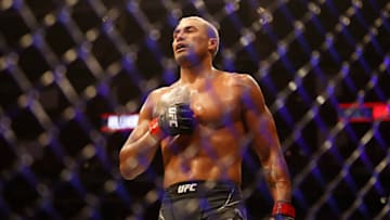 Feb 12, 2022; Houston, Texas, UNITED STATES; Carlos Ulberg (red gloves) reacts to the fight against Fabio Cherant (blue gloves) during UFC 271 at Toyota Center. Mandatory Credit: Troy Taormina-USA TODAY Sports