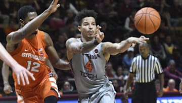 Jan 10, 2017; Blacksburg, VA, USA; Virginia Tech guard Seth Allen (4) passes the ball against the Syracuse Orange in the second half at Cassell Coliseum. Mandatory Credit: Michael Shroyer-USA TODAY Sports