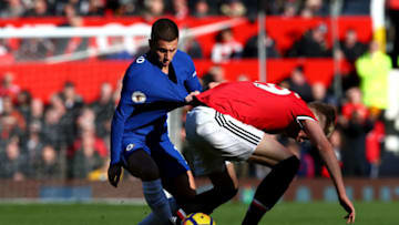 MANCHESTER, ENGLAND - FEBRUARY 25: Eden Hazard of Chelsea and Scott McTominay of Manchester United compete for the ball during the Premier League match between Manchester United and Chelsea at Old Trafford on February 25, 2018 in Manchester, England. (Photo by Clive Brunskill/Getty Images)