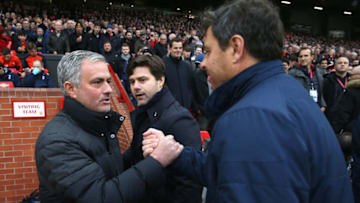 MANCHESTER, ENGLAND - DECEMBER 11: Manager Jose Mourinho of Manchester United greets Manager Mauricio Pochettino ahead of the Premier League match between Manchester United and Tottenham Hotspur at Old Trafford on December 11, 2016 in Manchester, England. (Photo by John Peters/Man Utd via Getty Images)