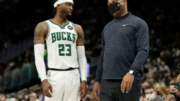 MILWAUKEE, WISCONSIN - JANUARY 05: Darvin Ham Assistant Coach of the Milwaukee Bucks talks with Wesley Matthews #23 of the Milwaukee Bucks during the game against the Toronto Raptors at Fiserv Forum on January 05, 2022 in Milwaukee, Wisconsin. Raptors defeated the Bucks 117-111. NOTE TO USER: User expressly acknowledges and agrees that, by downloading and or using this photograph, User is consenting to the terms and conditions of the Getty Images License Agreement. (Photo by John Fisher/Getty Images)