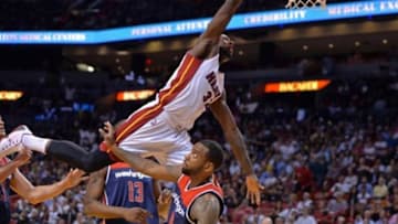 Oct 29, 2014; Miami, FL, USA; Miami Heat forward James Ennis (32) dunks over Washington Wizards forward Rasual Butler (8) during the second half at American Airlines Arena. Miami won 107-95. Mandatory Credit: Steve Mitchell-USA TODAY Sports