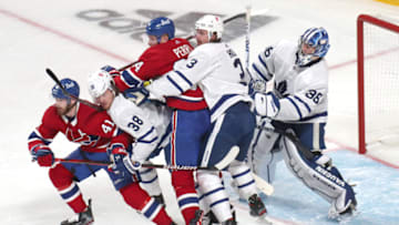 May 24, 2021; Montreal, Quebec, CAN; Toronto Maple Leafs goaltender Jack Campbell (36) and defensemen Rasmus Sandin (38) and Justin Holl (3) in action against right wings Paul Byron (41) and Corey Perry (94) during the third period of the game three of the first round of the 2021 Stanley Cup Playoffs at Bell Centre. Mandatory Credit: Jean-Yves Ahern-USA TODAY Sports