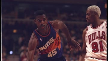 28 Jan 1996: Forward A.C. Green #45 of the Phoenix Suns dribbles down court beside guard Dennis Rodman #91 of the Chicago Bulls at the United Center in Chicago, Illinois. The Bulls defeated the Suns 93-82. Mandatory Credit: Jonathan Daniel/Allsport