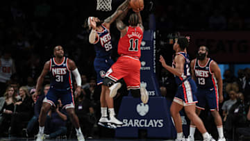Dec 4, 2021; Brooklyn, New York, USA; Chicago Bulls forward DeMar DeRozan (11) shoots the ball against Brooklyn Nets guard DeAndre' Bembry (95) during the second half at Barclays Center. Mandatory Credit: Vincent Carchietta-USA TODAY Sports